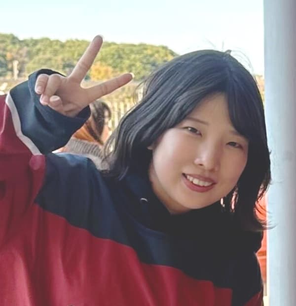 米良 文花